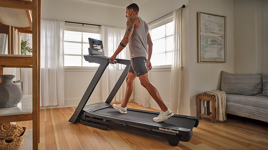 Man walking on the T Series 10 in home office