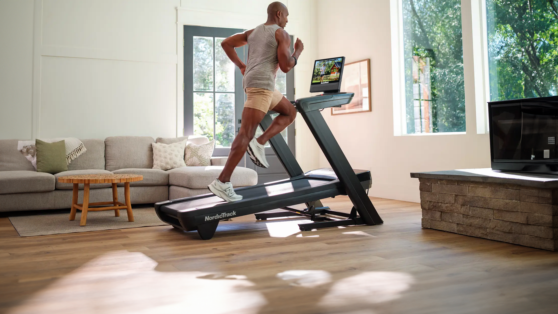 Man running on SmartAdjust while running on treadmill