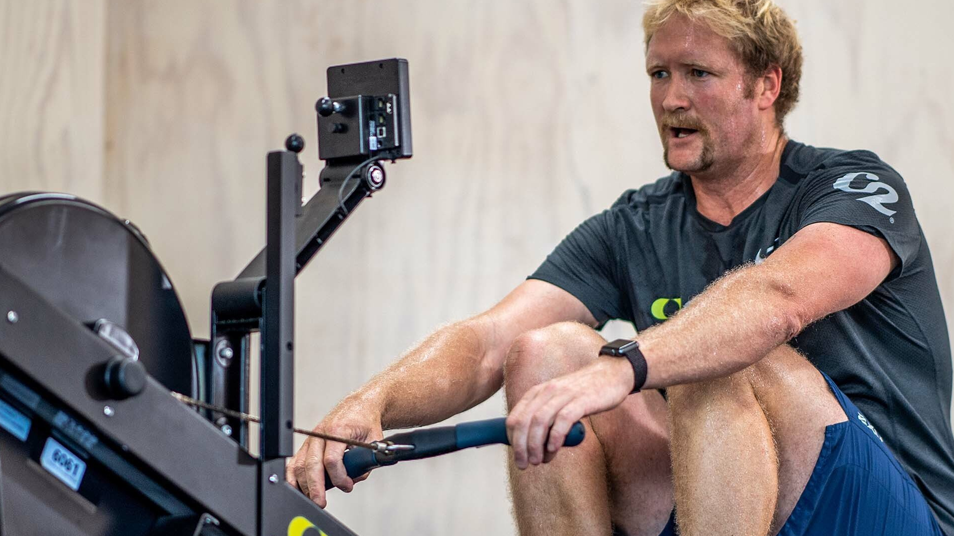 Close up of man working out on Concept2 RowErg