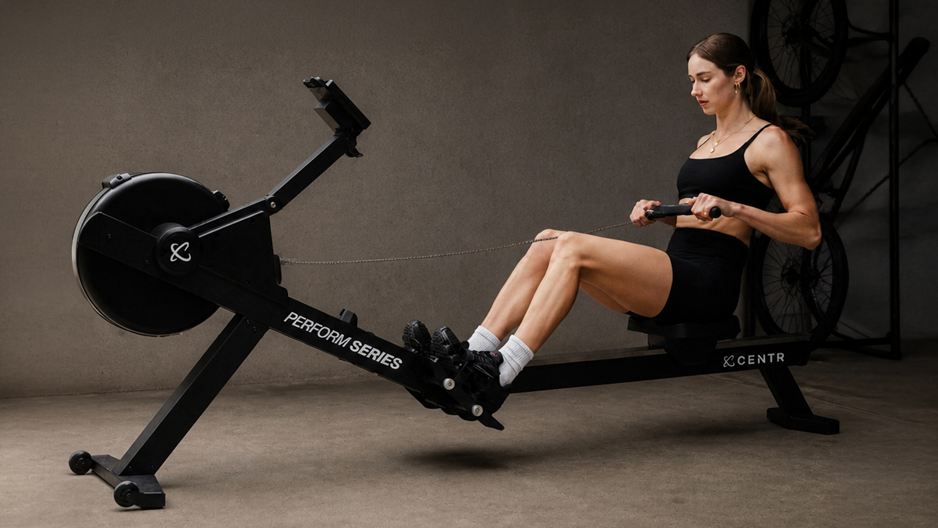 Athlete training on Centr Perform Series Rower