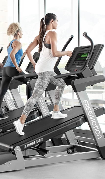 Woman on Freemotion i10.9b Incline Trainer