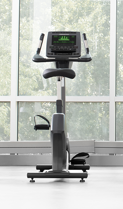 Woman on Freemotion u10.9b Upright Bike