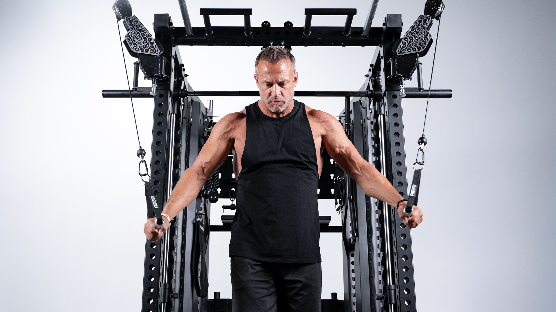 Man using Force USA C20 All-In-One Trainer