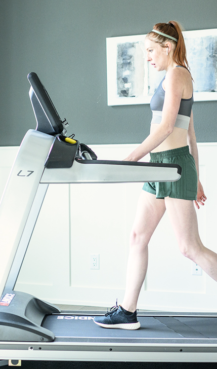 Woman walking on Landice L7 treadmill