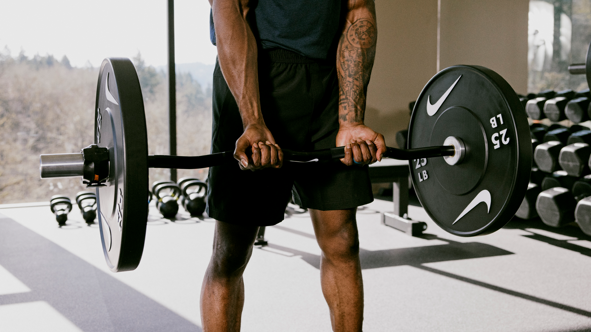Nike Barbell Collars secured on a loaded barbell