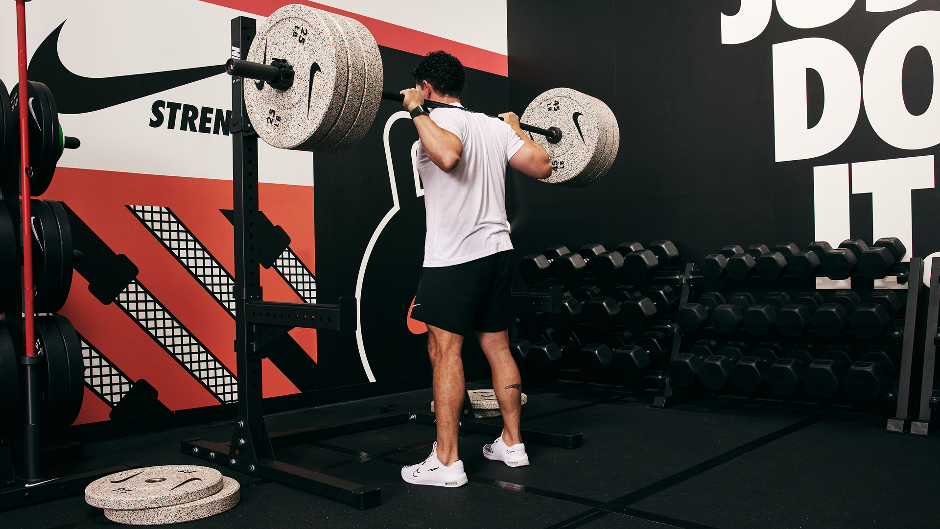 Nike Grind Bumper Plates loaded on an Olympic barbell