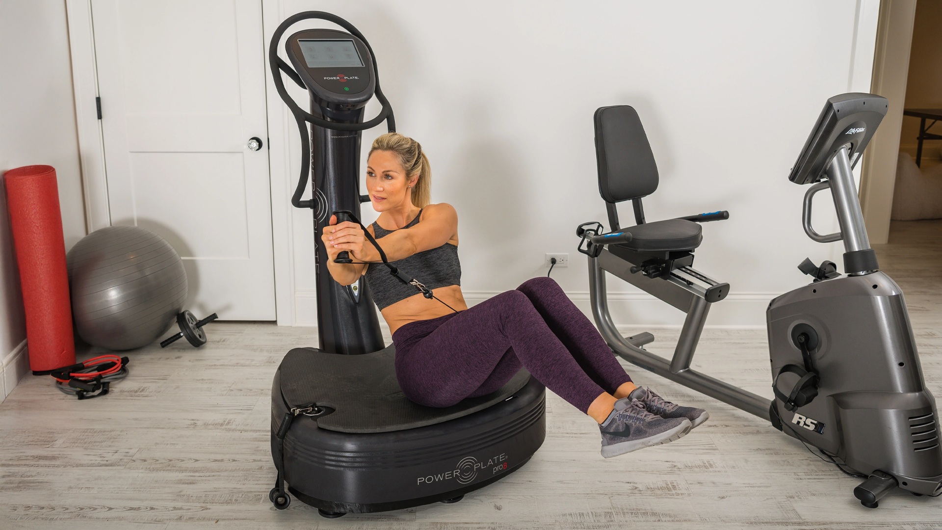 Woman using Power Plate Pro8