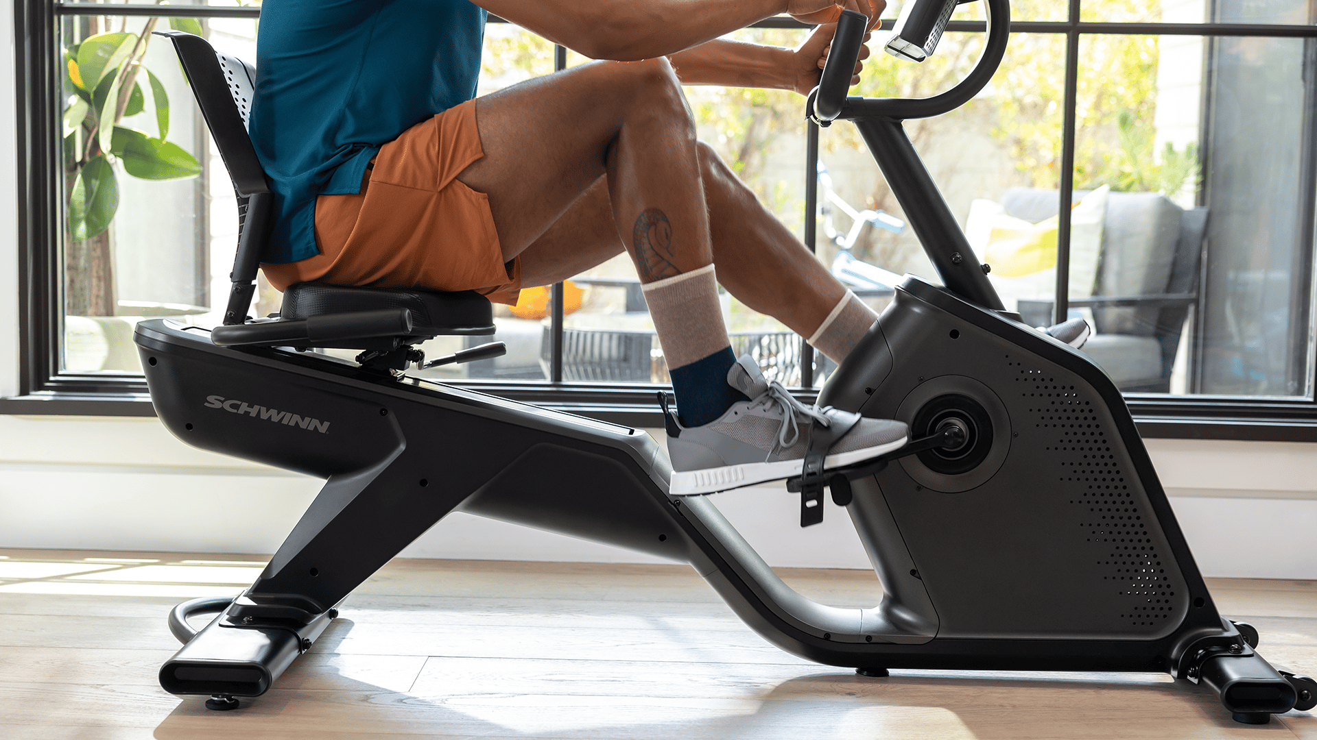 Man on Schwinn 290 Recumbent Bike close up