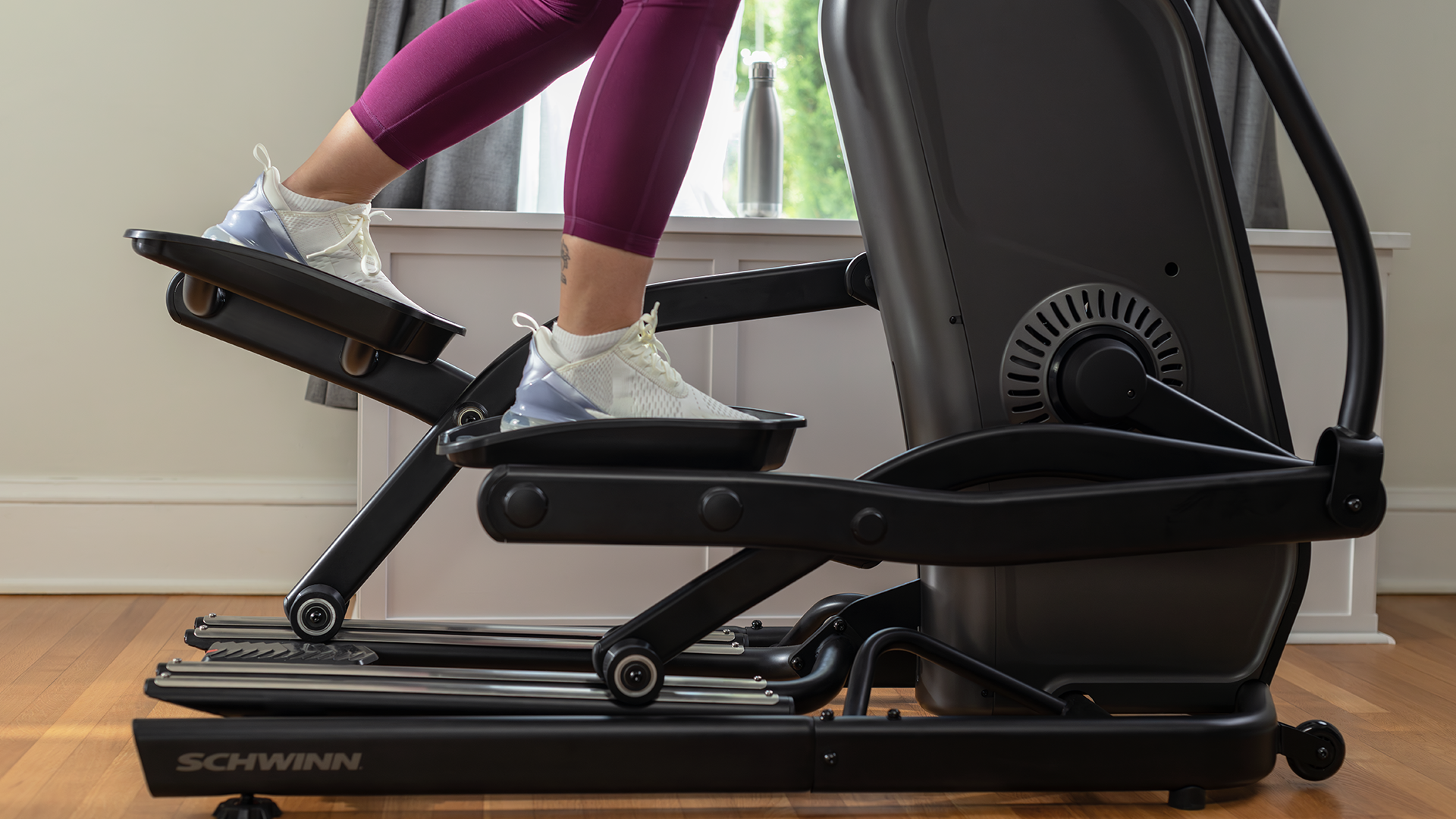 Man on Schwinn 490 Elliptical close up