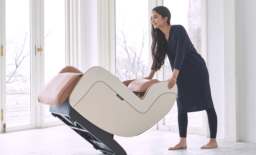 Woman moving Synca CirC+ Massage Chair