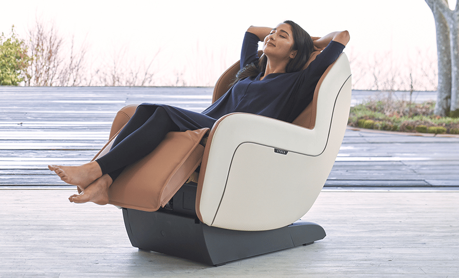 Woman relaxing in CirC+ Massage Chair