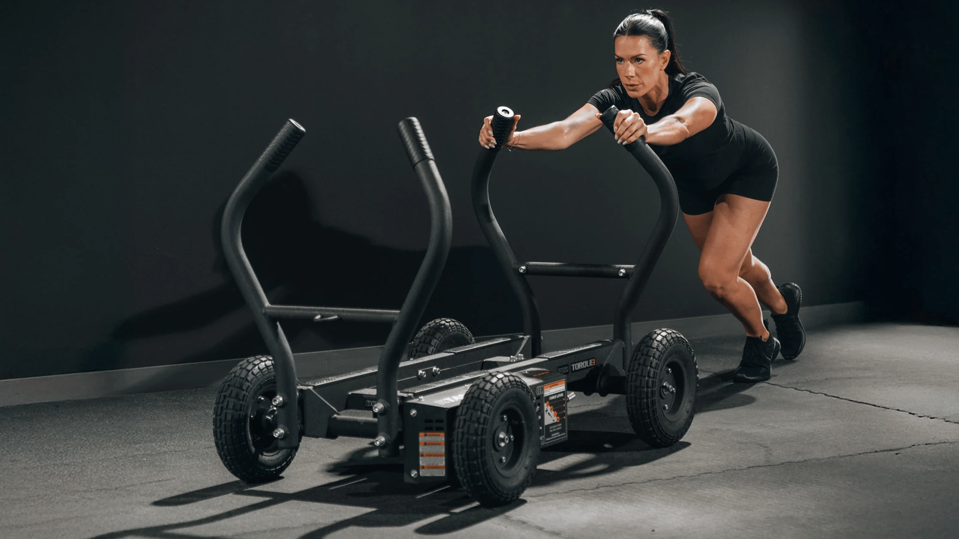 Woman working out with Torque Tank™ M4