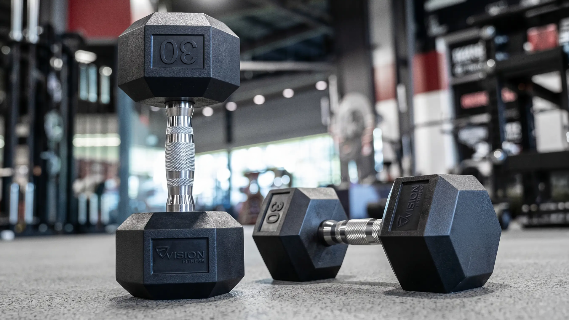 Vision Fitness Rubber Hex Dumbbells in gym enviornment