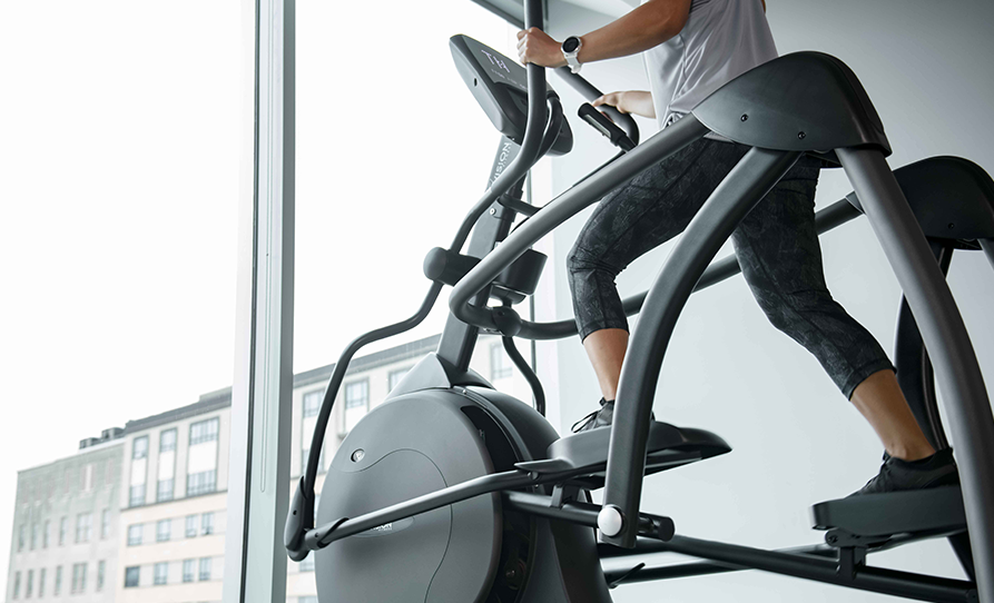 Woman on Vision VFS60 Suspension Elliptical