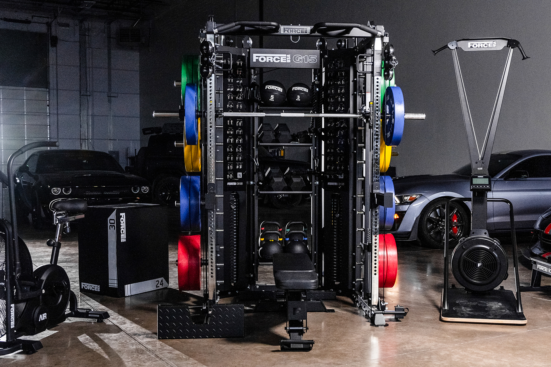 Man working out on Matrix functional trainer in his home workout space